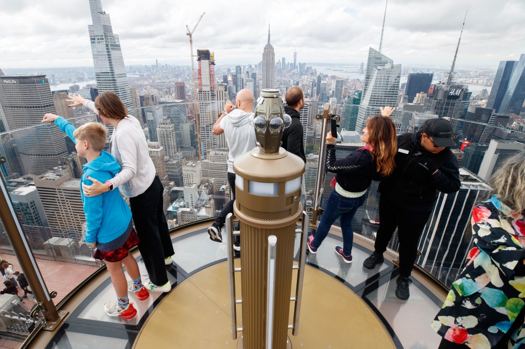 Top of the Rock opened Skylift on Tuesday. It is a new 360-degree rotating observation deck that sits atop the building's 70th floor and takes viewers 900 feet into the air.