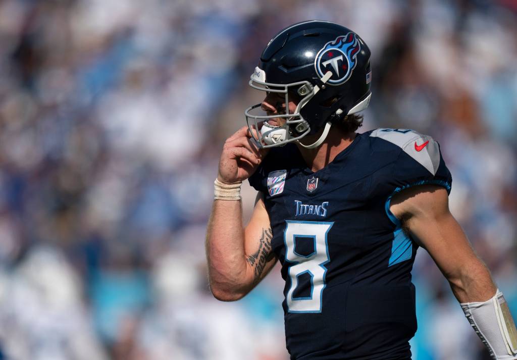 Will Levis (8) heads off the field after throwing a fourth quarter interception against the Indianapolis Colts during their game at Nissan Stadium in Nashville, Tenn., Monday, Oct. 14, 2024.