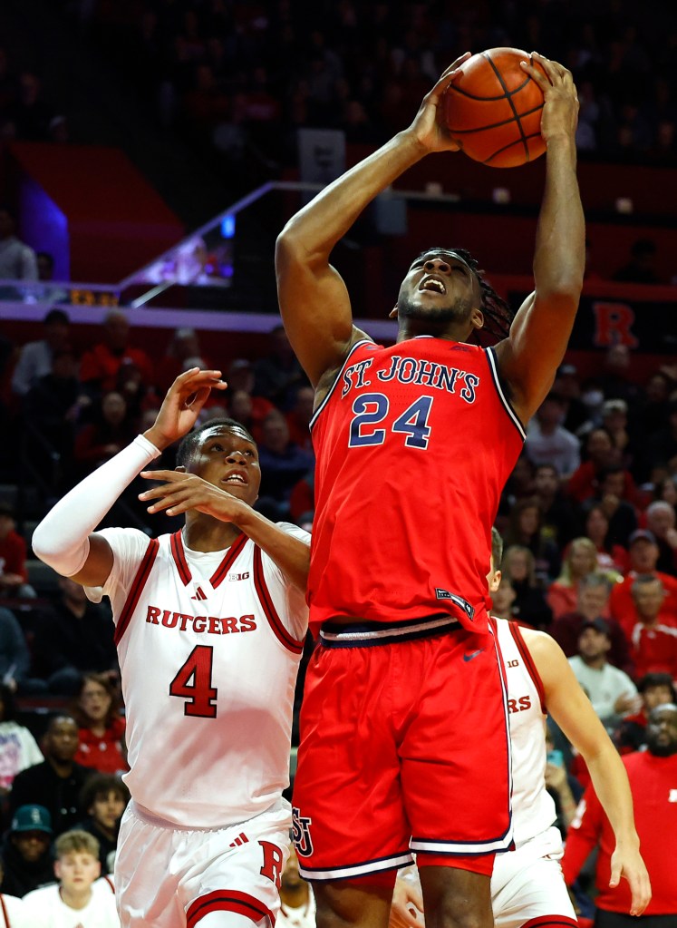 Zuby Ejiofor shoots over Airious Bailey during St. John's exhibition win over Rutgers.