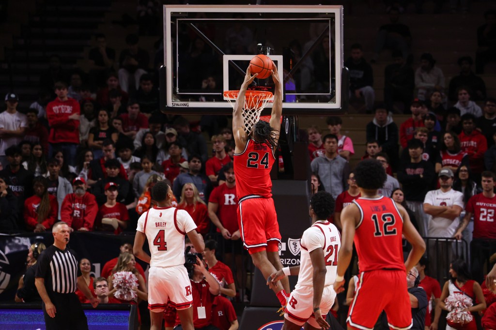 Zuby Ejiofor slams home two of his 27 points in St. John's 91-85 exhibition win over Rutgers on Oct. 17, 2024.