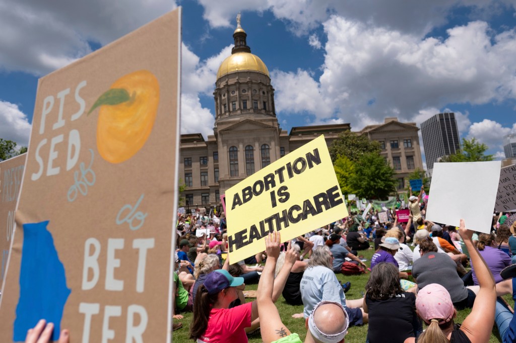 The hot-button issue has ignited a firestorm of protests, such as this Atlanta demonstration in May. 