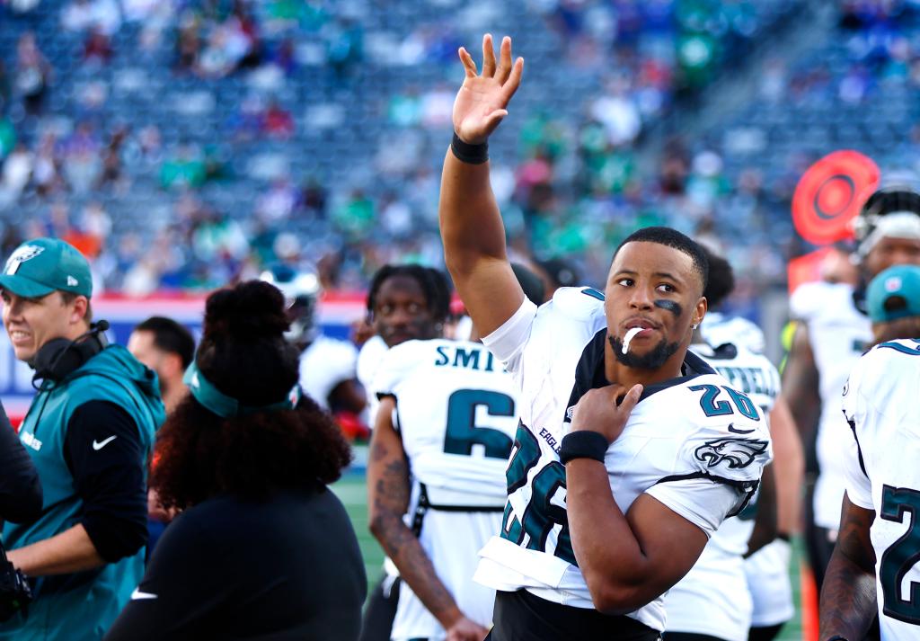 Saquon Barkley acknowledges fans during the Eagles' win over the Giants on Oct. 20, 2024. 