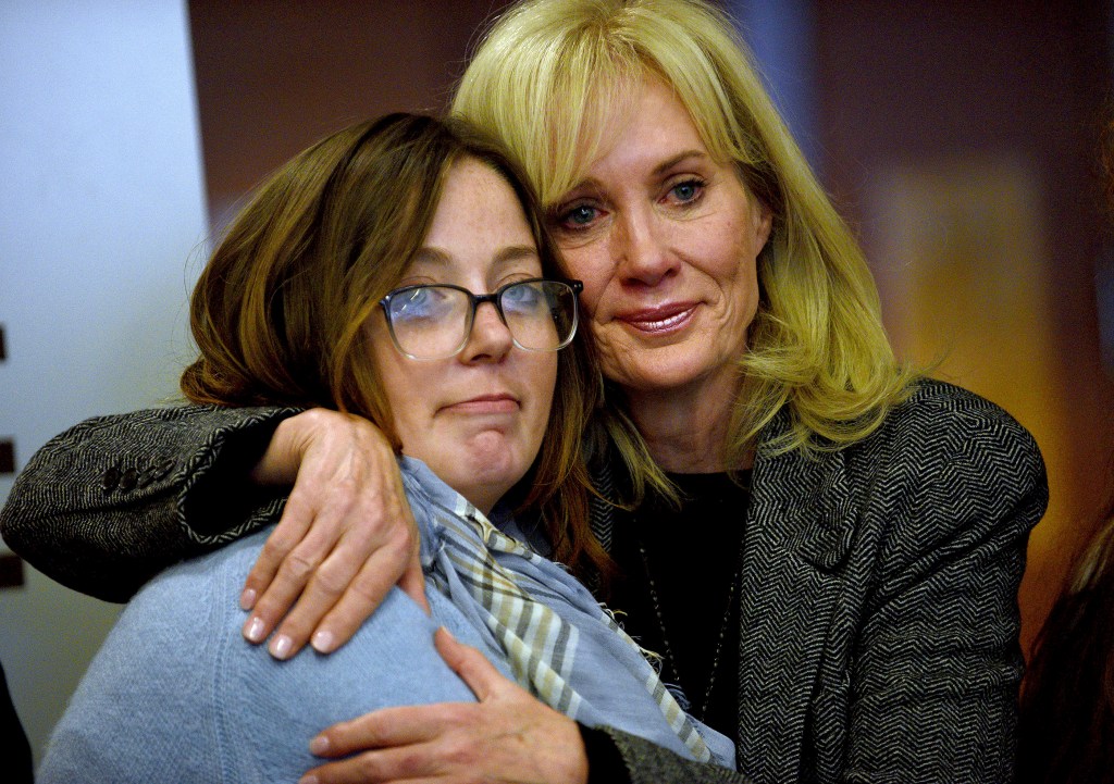 Alexandra Eckersley hugging her mother Nancy after her sentence was suspended.