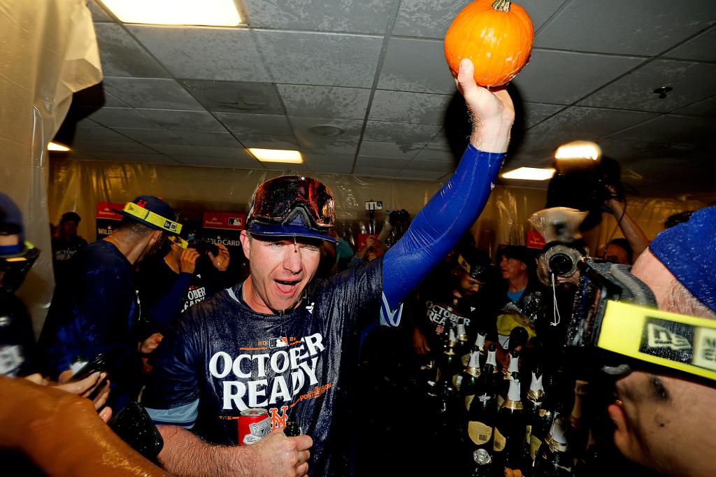 Pete Alonso celebrates in the clubhouse after the Mets' Game 3 win on Oct. 3.