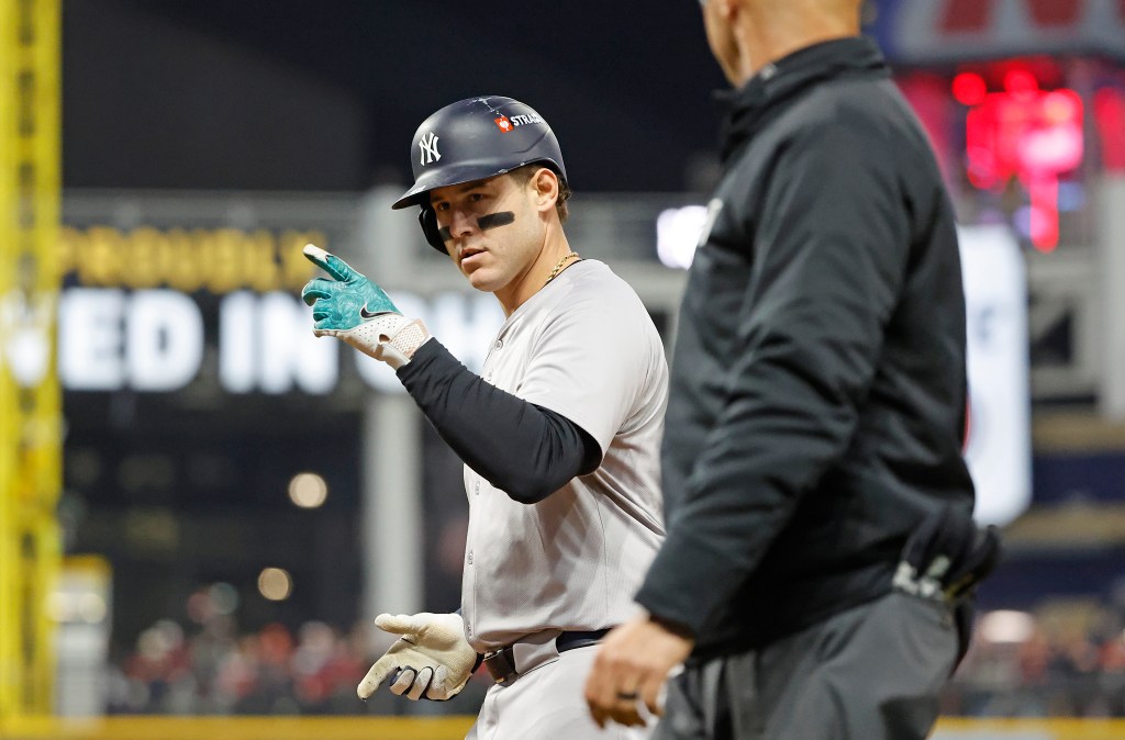 Anthony Rizzo #48 of the New York Yankees reacts after he hits a single