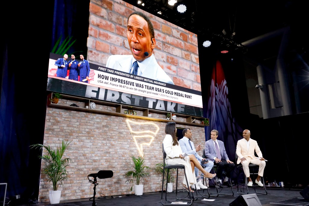 (L-R) Molly Qerim, Stephen A. Smith, Chris Russo and Ryan Clark speak onstage at the Fanatics Fest NYC 2024 at Jacob Javits Center on August 16, 2024 in New York City.  