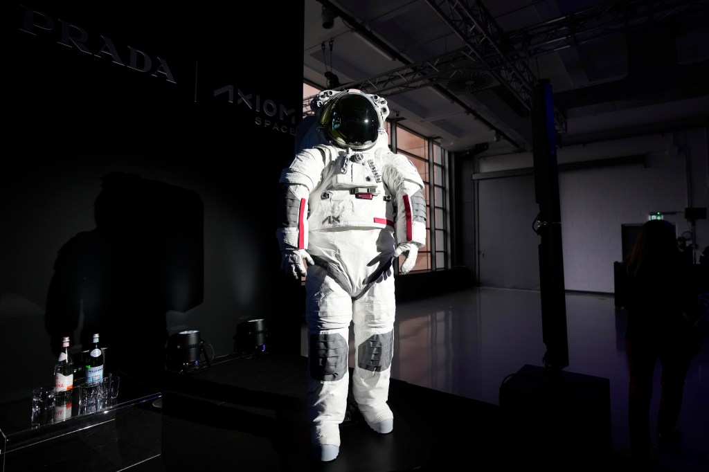 Prada-designed Axiom Space spacesuit on a stand, set to be used by NASA from 2026, presented in Milan, Italy