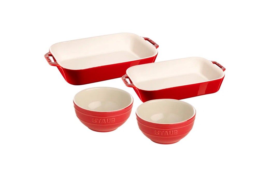 A group of red and white bakeware bowls