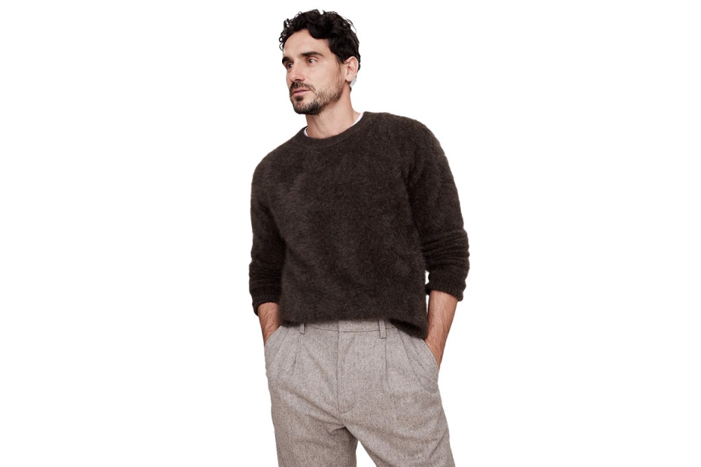 Arthur Kulkov wearing a brown sweater in a Banana Republic campaign