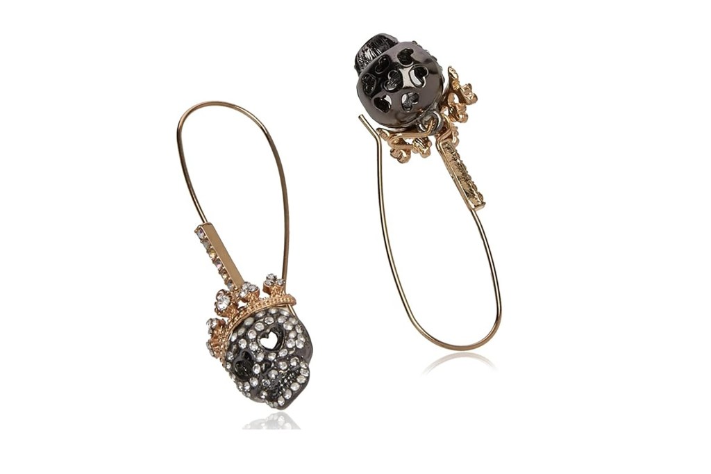 A pair of skull-shaped earrings