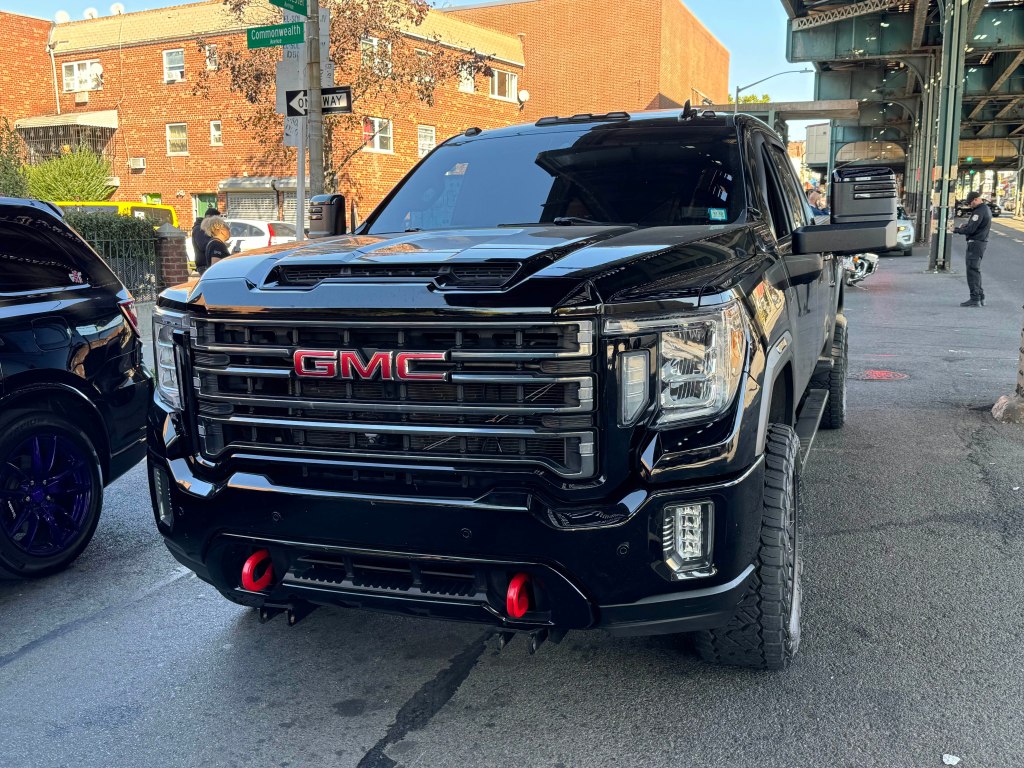 A photo of a black GMC pickup truck involved in the deadly collision