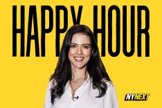 Lydia Moynihan in front of "Happy Hour" sign.