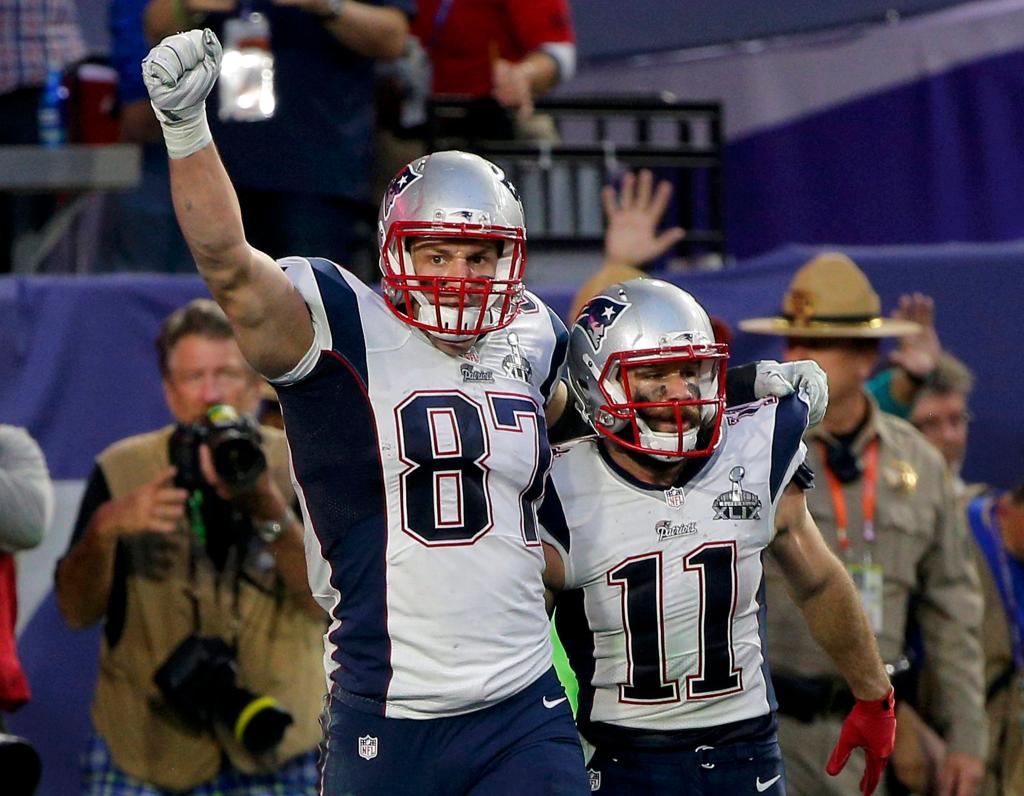 Patriots tight end Rob Gronkowski (87) celebrates a second quarter touchdown against the Seattle Seahawks with teammate Julian Edelman (11) during the NFL Super Bowl XLIX football game in Glendale, Arizona February 1, 2015.  