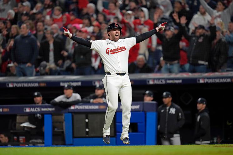 Cleveland Guardians' David Fry celebrating after hitting a game-winning two-run home run against the New York Yankees in the AL Championship Series