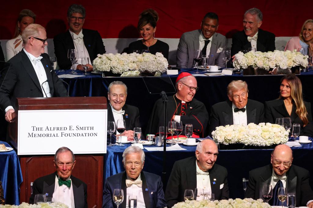 Jim Gaffigan delivering a speech at the 79th annual Alfred E. Smith Memorial Foundation Dinner with Donald and Melania Trump among attendees