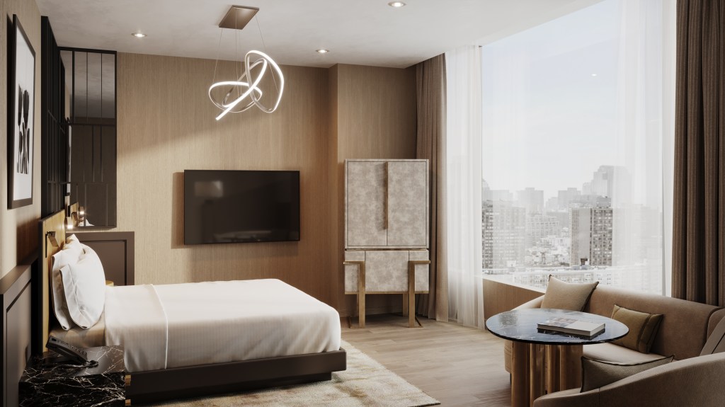 A luxurious room at the Ritz-Carlton NoMad featuring a comfortable bed and television