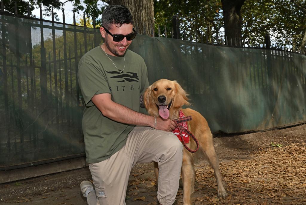 Scott Gary with his Golden Retriever named Leo. 