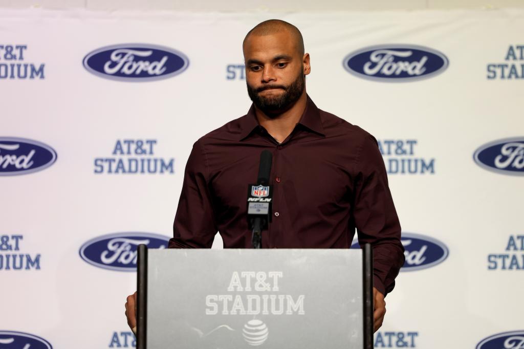 Dallas Cowboys quarterback Dak Prescott takes questions from during a news conference following the team's NFL football game against the Detroit Lions in Arlington, Texas, Sunday, Oct. 13, 2024. 