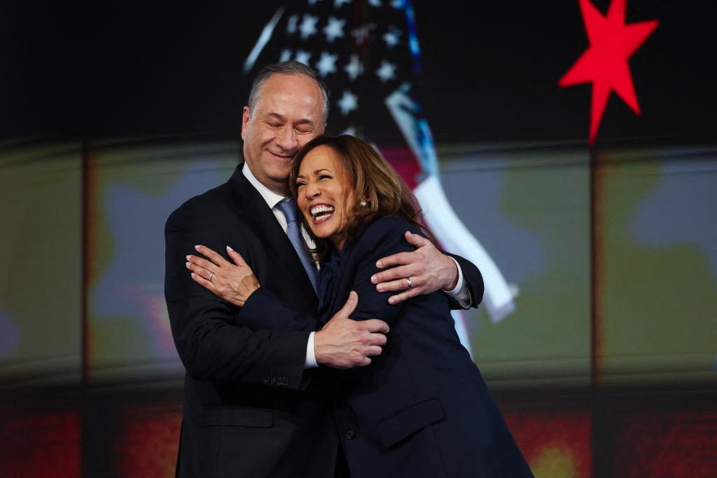 Doug Emhoff and Kamala Harris hugging.