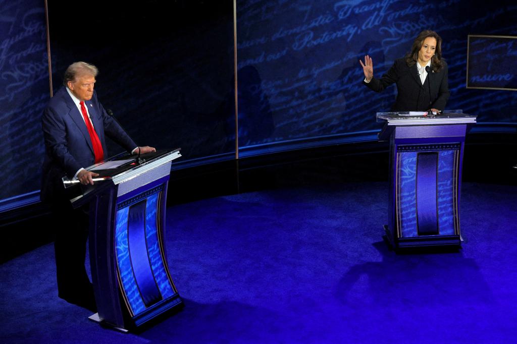 Democratic presidential nominee, U.S. Vice President Kamala Harris speaks during a presidential debate hosted by ABC as Republican presidential nominee, former U.S. President Donald Trump listens, in Philadelphia, Pennsylvania, U.S., September 10, 2024.