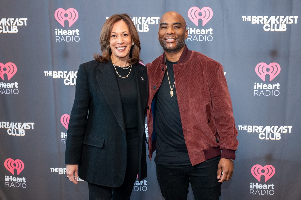 Democratic presidential nominee, Vice President Kamala Harris (L) and Charlamagne Tha God pose for a photo before "We The People: An Audio Townhall With Kamala Harris and Charlamagne Tha God" on October 15, 2024 in Detroit, Michigan
