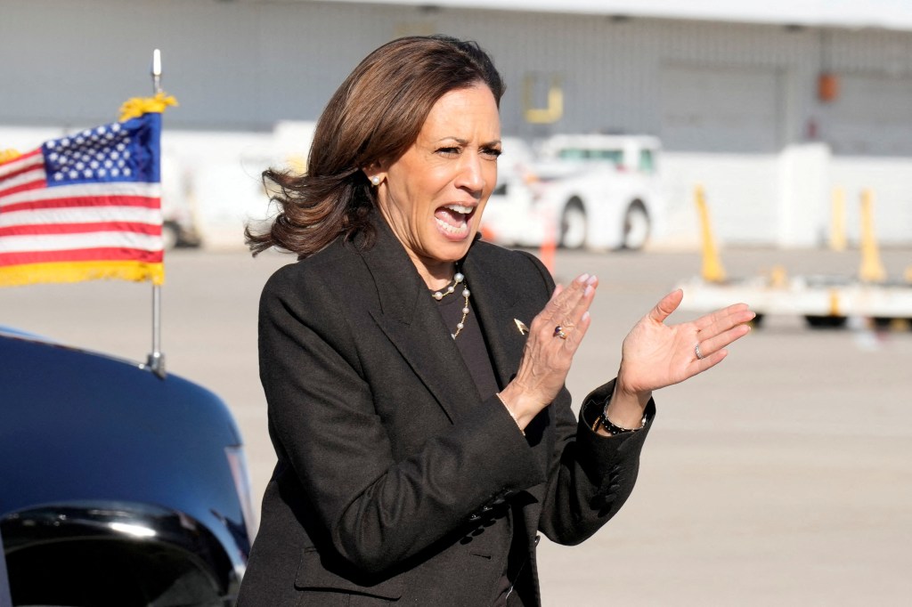 Democratic presidential nominee Vice President Kamala Harris walks to Air Force Two as she departs from Gerald R. Ford International Airport in Grand Rapids, Mich., Friday, Oct. 18, 2024, en route to Lansing, Mich.