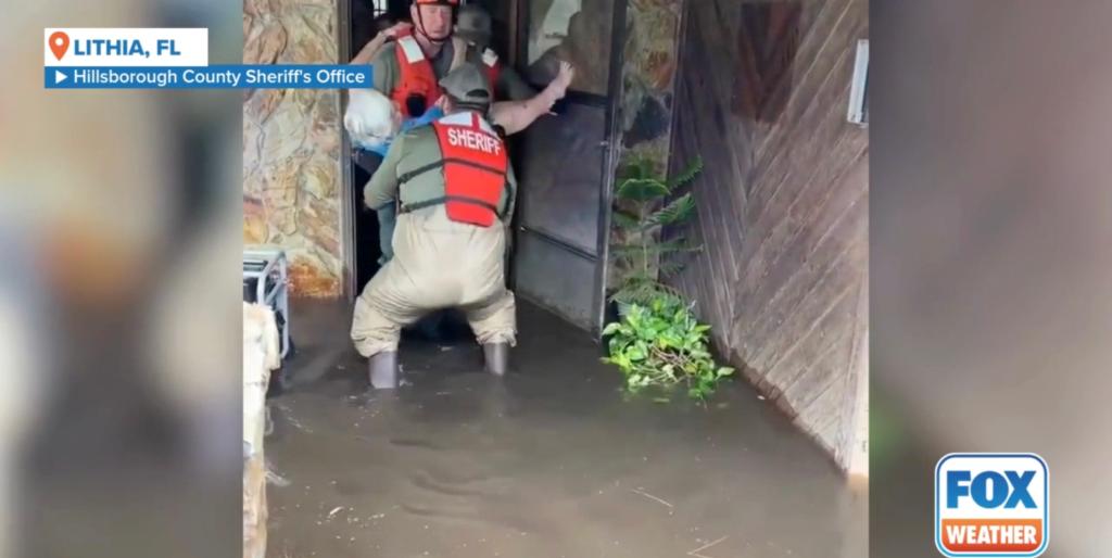 Deputies with the Hillsborough County Sheriff's Office rescued a 91-year-old woman stranded in her home as floodwaters rose 