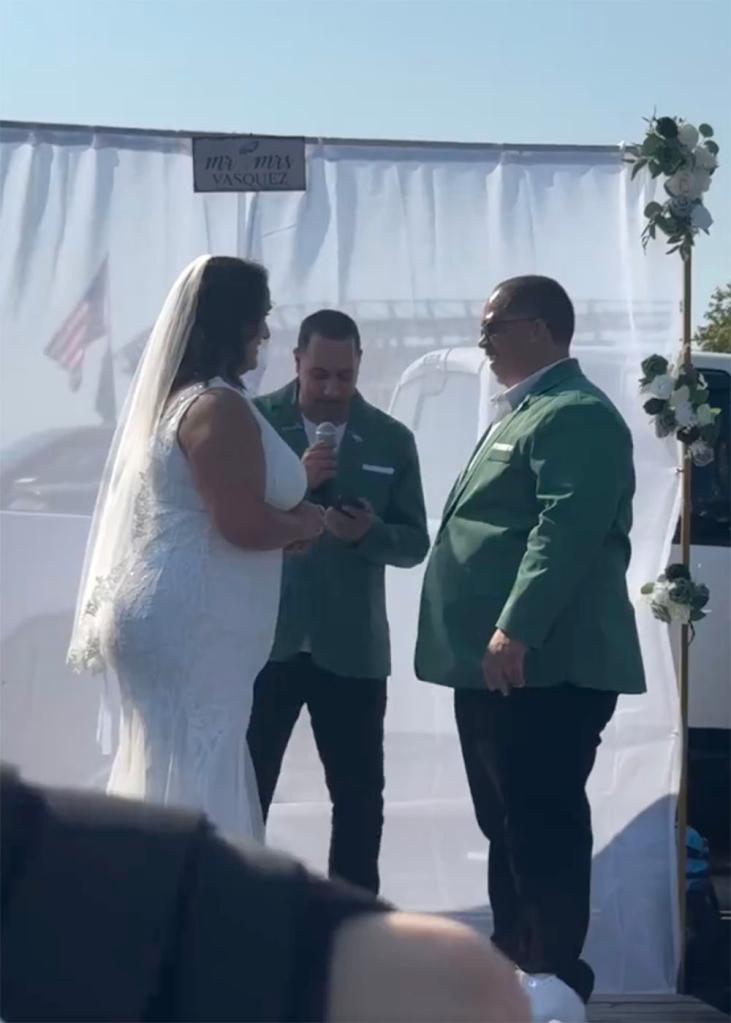 Two Eagles fans got married at a tailgate in the parking lot at Lincoln Financial Field in Philadelphia on Oct. 13, 2024. 