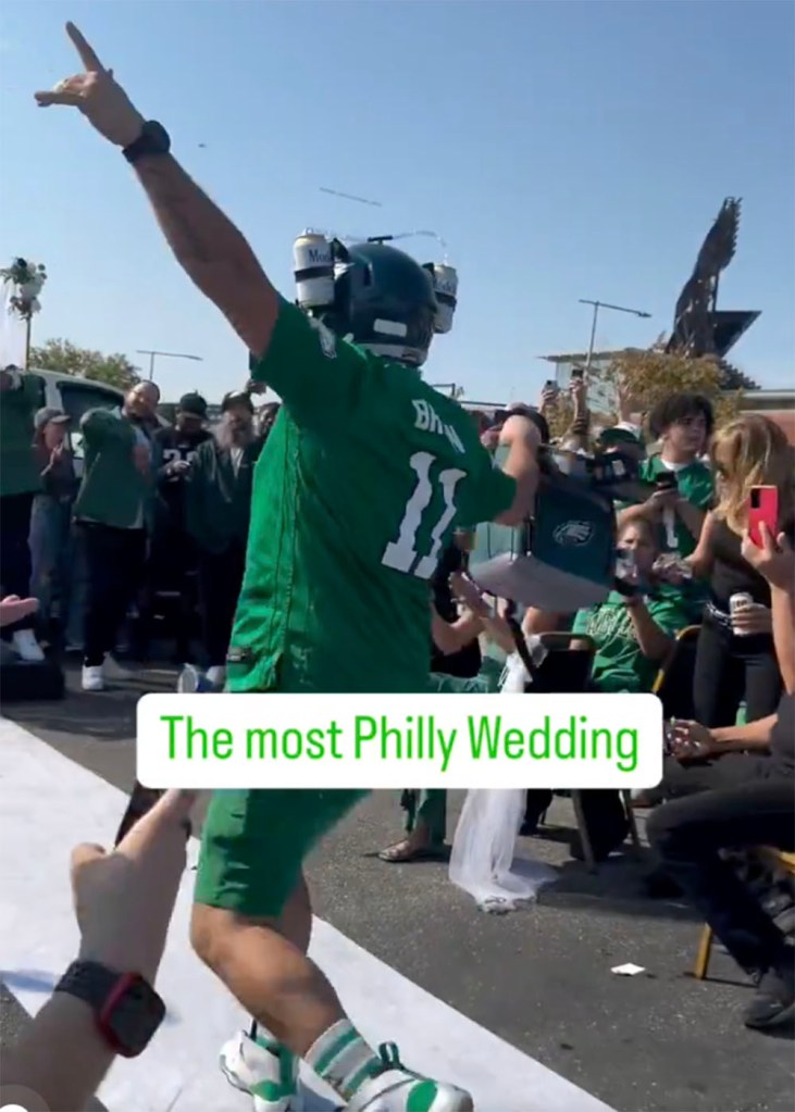 Two Eagles fans got married at a tailgate in the parking lot at Lincoln Financial Field in Philadelphia on Oct. 13, 2024. 