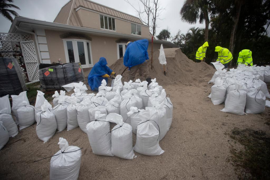 Sonf of the Sea hotel employees on Sanibel Island filling sang bags ahead of the hurricane.