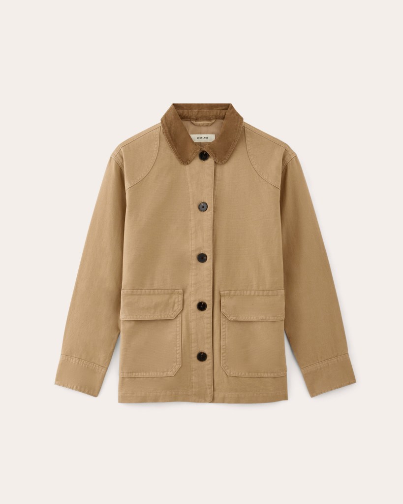 A beige Everlane barn jacket with black buttons