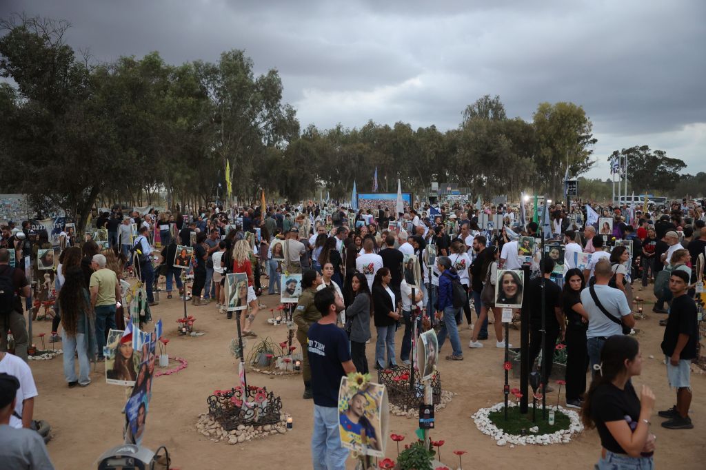 Families of victims killed at the Supernova music festival attend a gathering in memory of their relatives