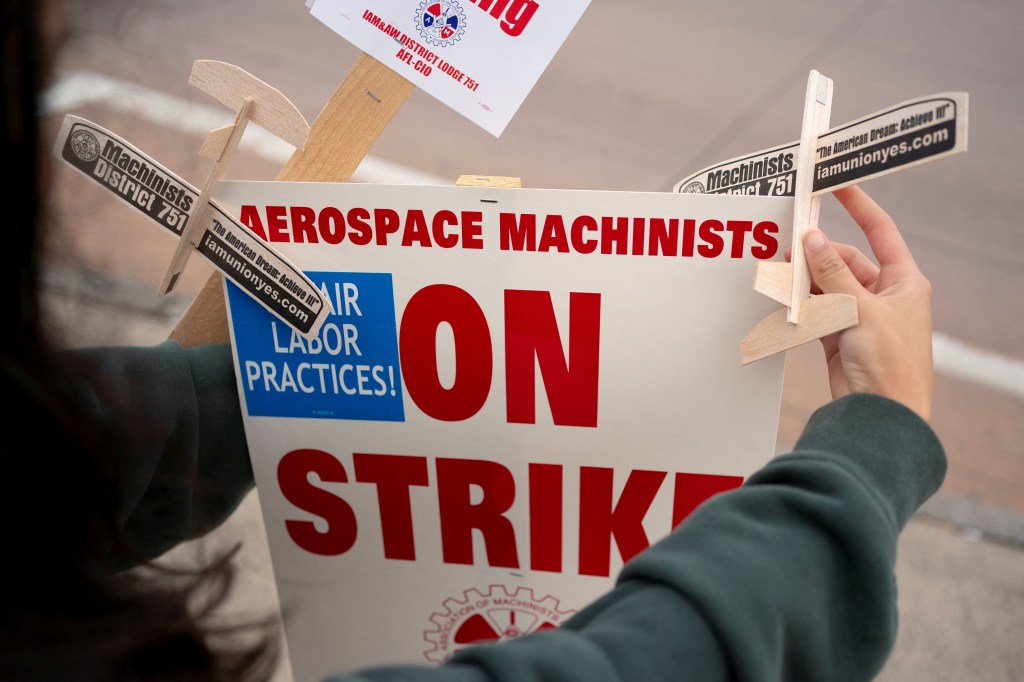 Sign that says "Aerospace Machinists ON STRIKE!"