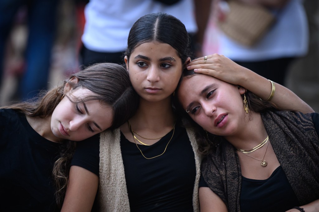 Family members and friends gathered at the Nova Festival site in Re'im, Israel, marking the one year anniversary of the Hamas' attacks