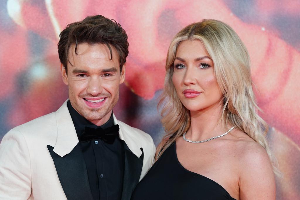 Liam Payne and Kate Cassidy posing for a photo at the premiere of All Of Those Voices in London.