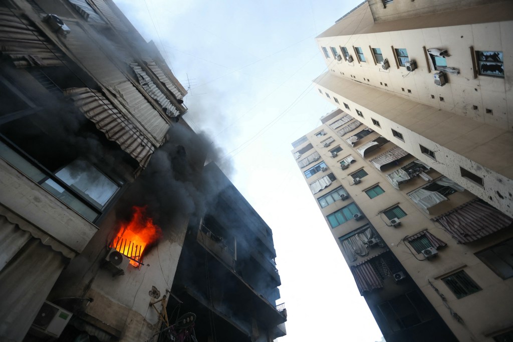 The blasts sent huge plumes of smoke and flames into the sky.