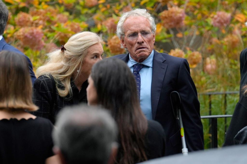 Joe Kennedy III in a suit outside Ethel's funeral.