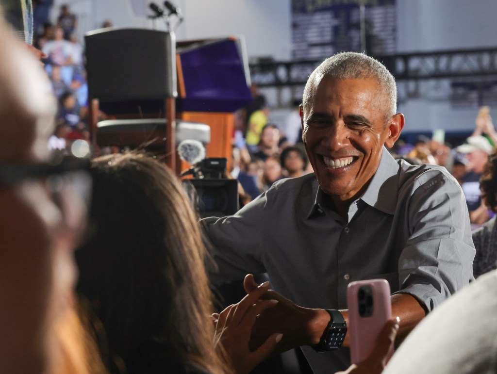 Former President Barack Obama meets with supporters before speaking at a campaign rally supporting Democratic presidential nominee Vice President Kamala Harris, Saturday, Oct. 19, 2024, in North Las Vegas, Nev.