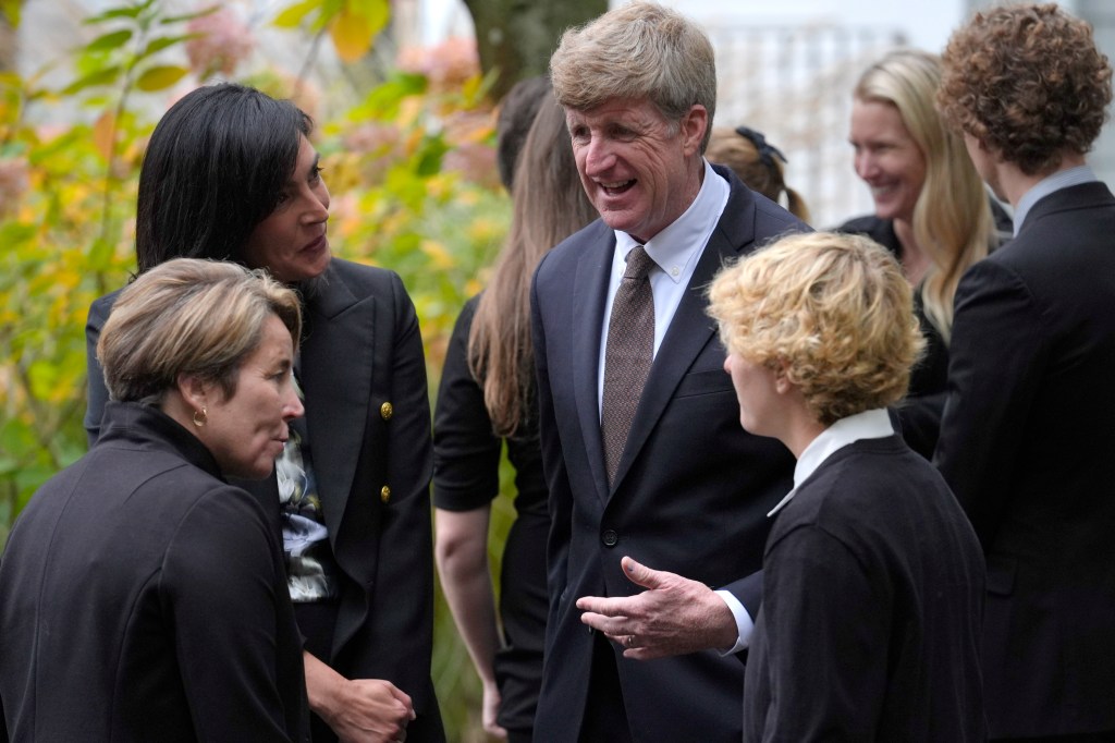 Former U.S. Rep. Patrick Kennedy speaking with Massachusetts Gov. Maura Healey after Ethel Kennedy's funeral at Our Lady of Victory church