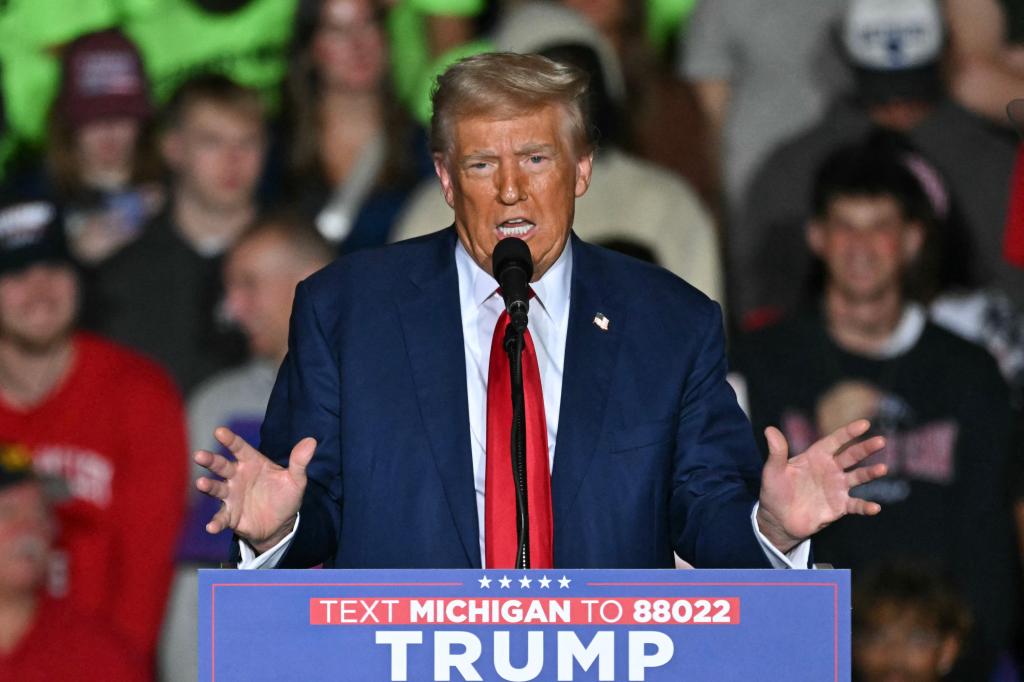 Former US President and Republican presidential candidate Donald Trump speaks during a campaign rally at the Ryder Center for Health and Physical Education at Saginaw Valley State University in Saginaw, Michigan, October 3, 2024. 