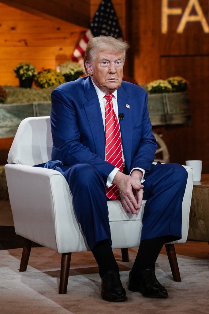 Donald Trump sitting in chair