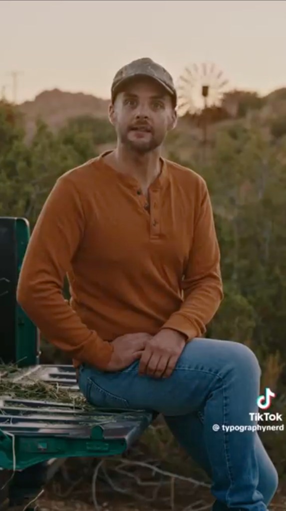 An actor from the pro Harris ad, sitting in a pick up truck