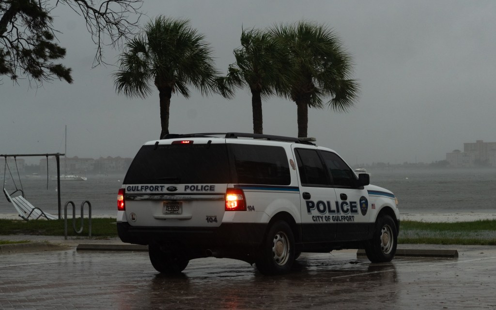 Police patrolling the streets around Tampa Bay are some of the only people left in the area as the storm approaches 