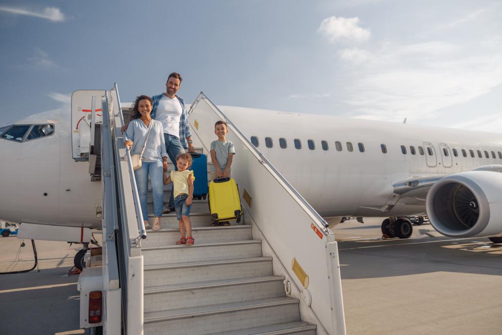 Family de-boarding a plane. 