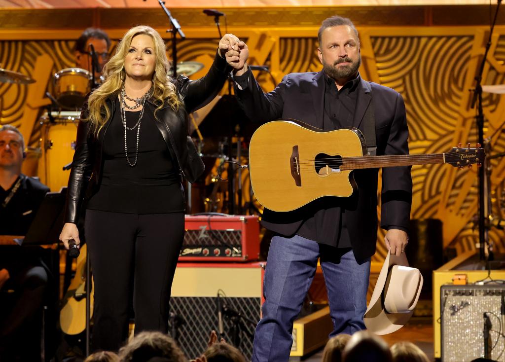 Trisha Yearwood and Garth Brooks perform onstage during Homeward Bound: A GRAMMY Salute To The Songs Of Paul Simon at Hollywood Pantages Theatre on April 06, 2022 in Hollywood, California.