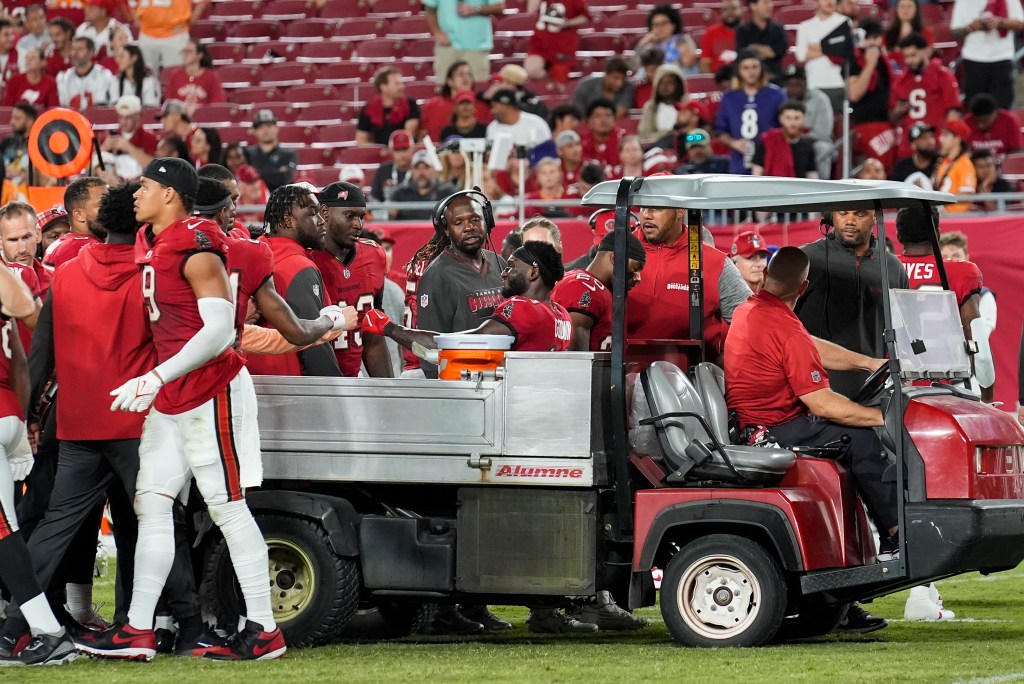 Chris Godwin is carted off the field during the Buccaneers' loss to the Ravens on Oct. 21, 2024. 