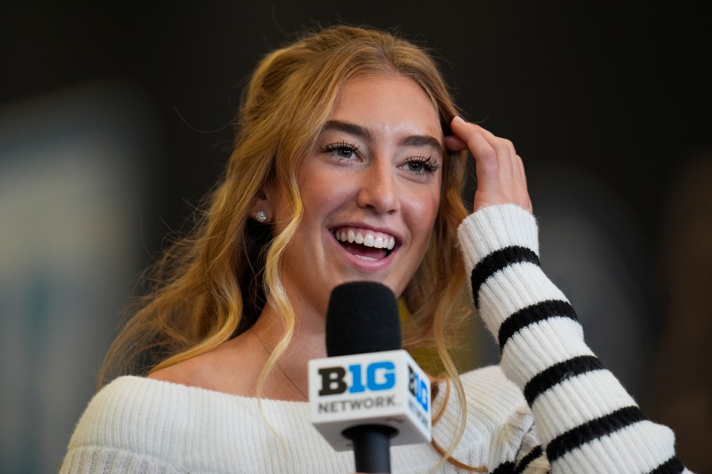 Iowa's Lucy Olsen speaks during the Big Ten women's NCAA college basketball media day Wednesday, Oct. 2, 2024, in Rosemont, Ill.