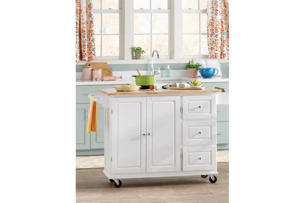 Kitchen island with a sink and a bowl on it