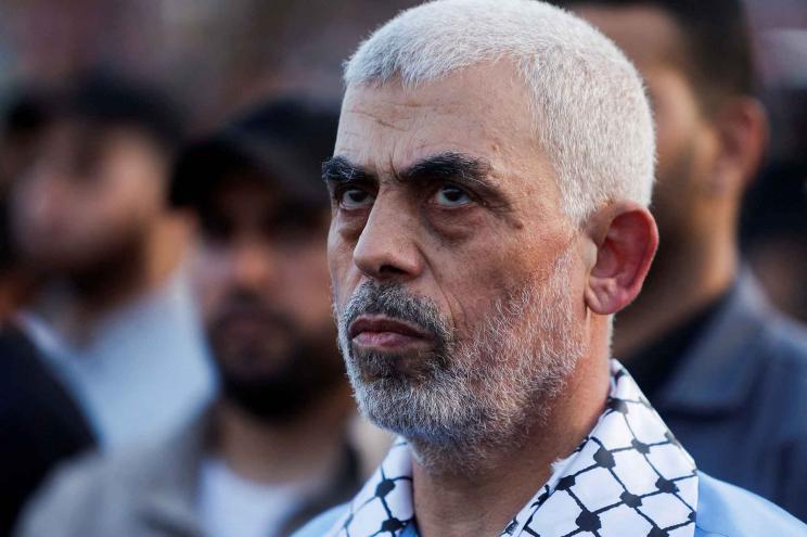 Hamas leader Yahya Sinwar looks on as Palestinian Hamas supporters take part in an anti-Israel rally over tension in Jerusalem's Al-Aqsa mosque, in Gaza City October 1, 2022.