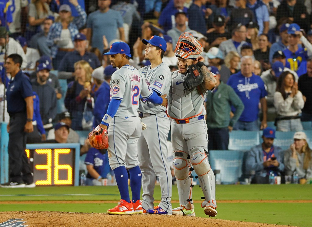 Francisco Lindor, Kodai Senga and Francisco Alvarez of the Mets react on the mound during the eighth inning. 